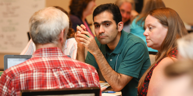 People talking sat at a table