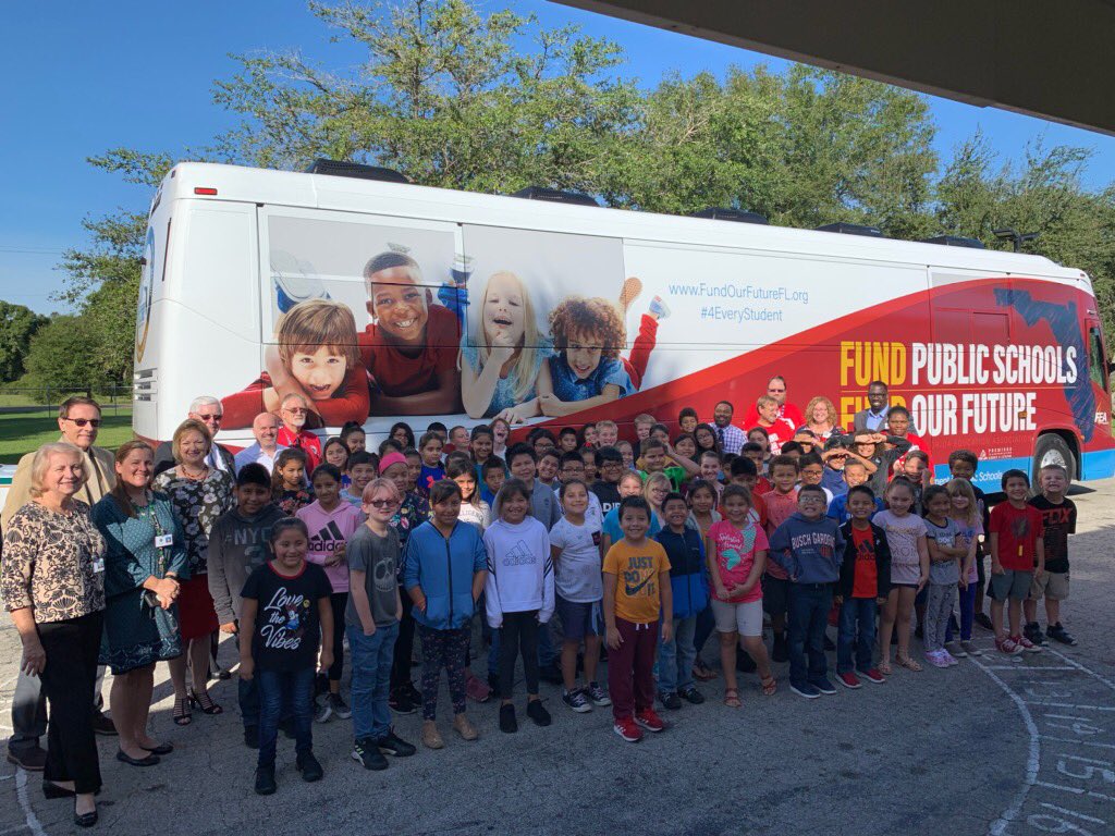 Nocatee Elementary kids with the bus