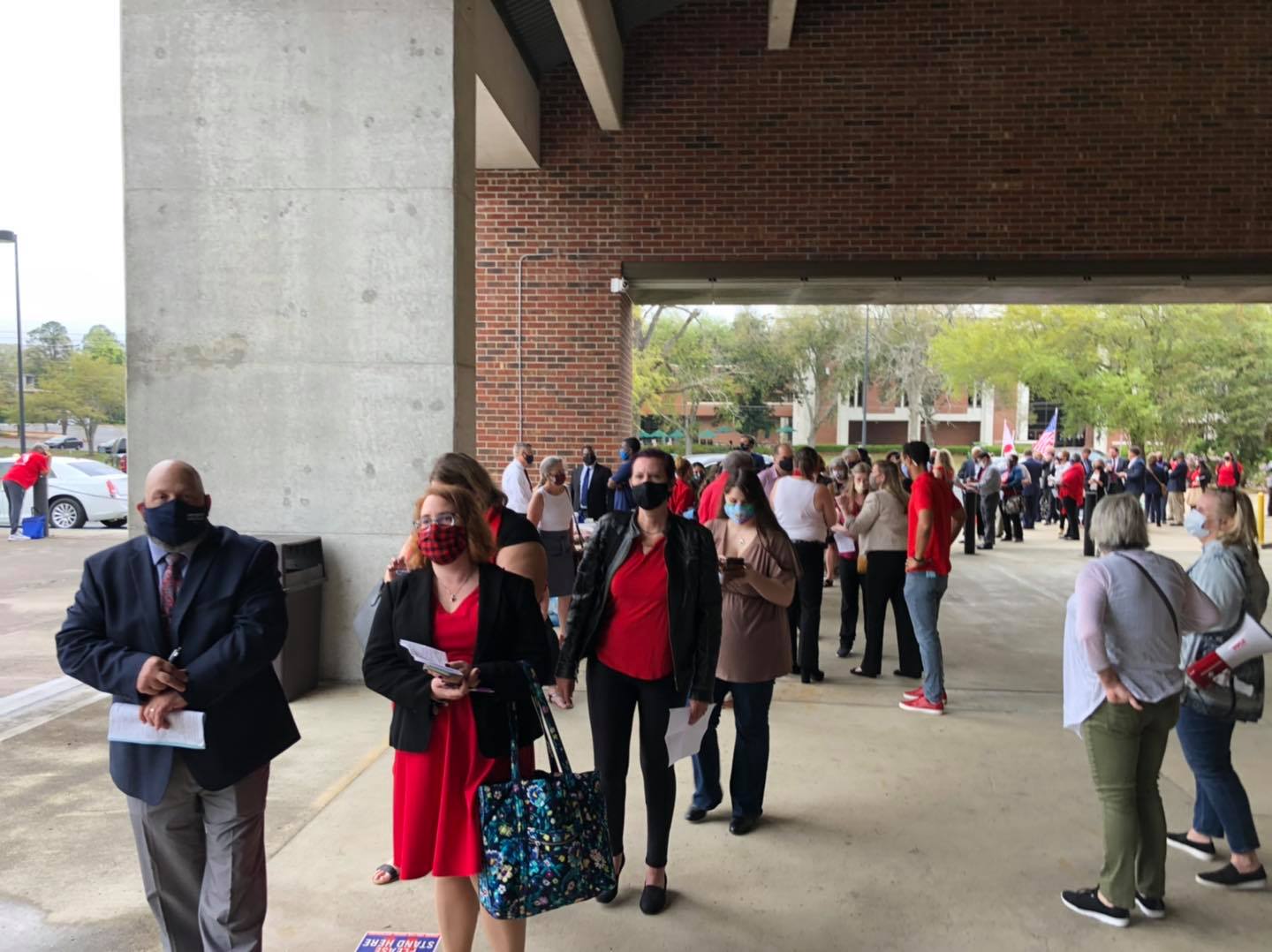 Long line of members waiting to testify at the civic center